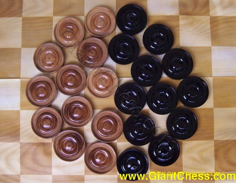Hand-carved teak chess and checker pieces