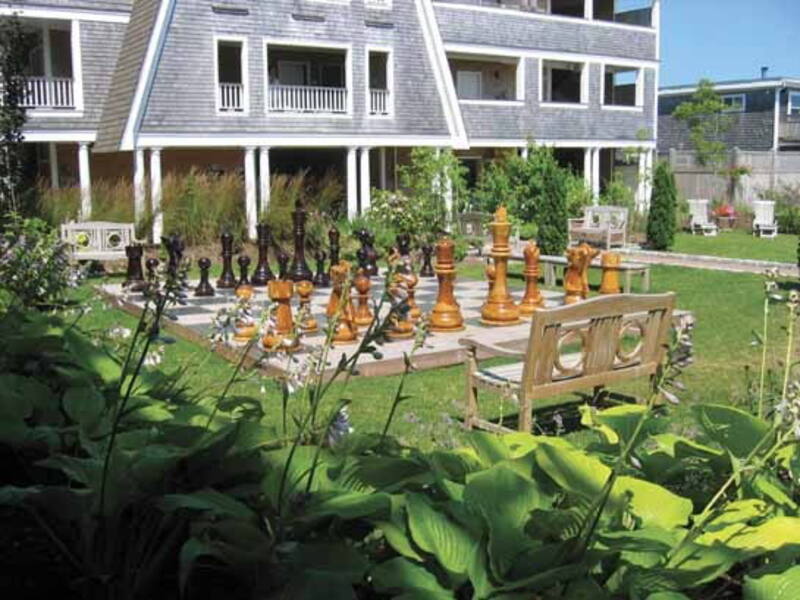 Giant chess set installed outdoors at a resort